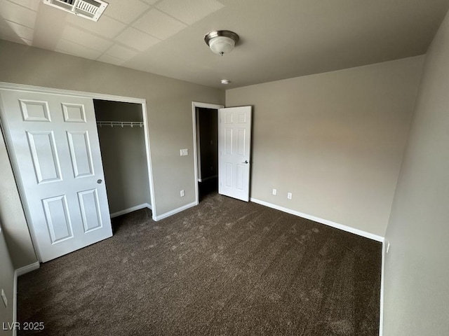 8116 Russell Creek Ct, Las Vegas, NV 89139 - unfurnished bedroom featuring dark carpet, baseboards, and a closet