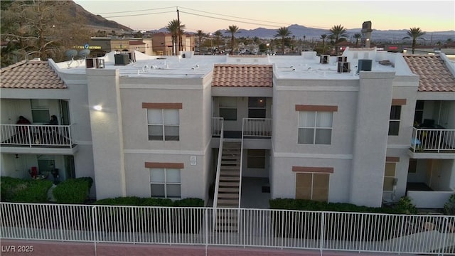6800 E Lake Mead Blvd Unit 1126, Las Vegas, NV 89156 - property at dusk with a mountain view