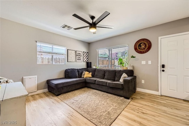 80 E Texas Ave, Henderson, NV 89015 - living room with ceiling fan, light wood finished floors, and baseboards