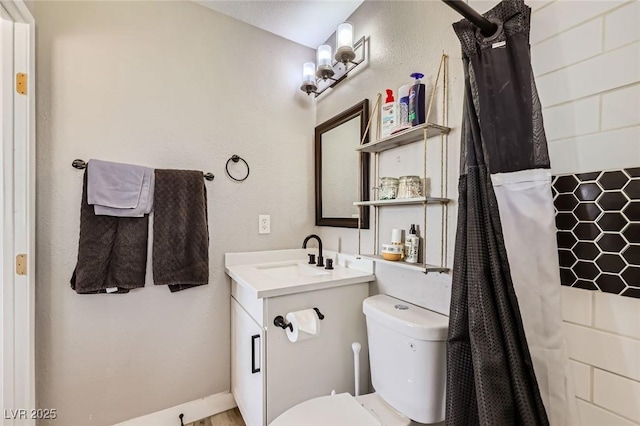 80 E Texas Ave, Henderson, NV 89015 - bathroom with toilet, vanity, and a shower with curtain