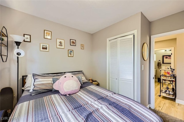 80 E Texas Ave, Henderson, NV 89015 - bedroom with a closet and wood finished floors