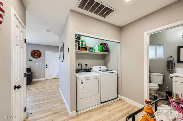 80 E Texas Ave, Henderson, NV 89015 - washroom featuring independent washer and dryer, light wood finished floors, and baseboards