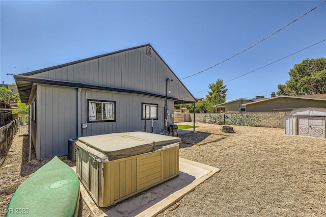 80 E Texas Ave, Henderson, NV 89015 - rear view of house with a hot tub and a fenced backyard
