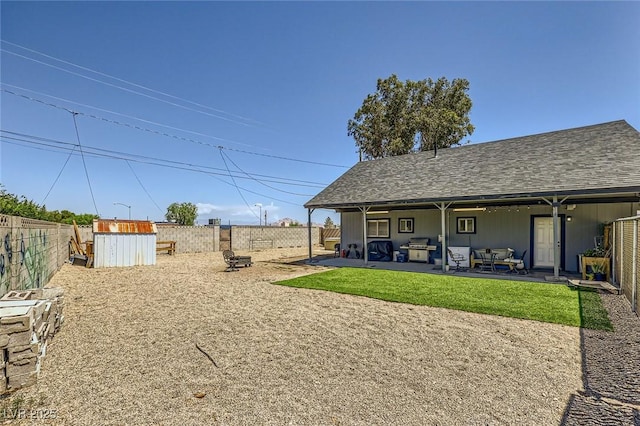 80 E Texas Ave, Henderson, NV 89015 - fenced backyard featuring an outdoor hangout area and a patio area