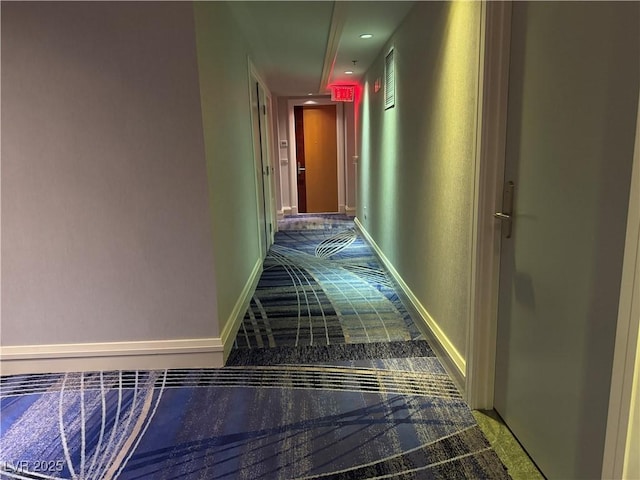 2700 Las Vegas Blvd Unit 2811, Las Vegas, NV 89109 - hall featuring baseboards, inlaid floor details, and carpet floors