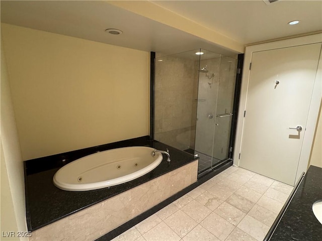 2700 Las Vegas Blvd Unit 2811, Las Vegas, NV 89109 - bathroom with a stall shower, a whirlpool tub, recessed lighting, and vanity