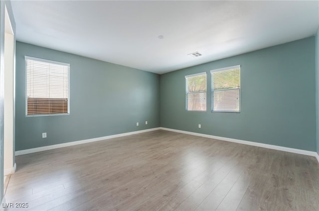 908 Cypress Gold Ct, North Las Vegas, NV 89031 - unfurnished room with wood finished floors and baseboards