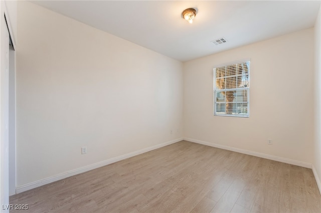 908 Cypress Gold Ct, North Las Vegas, NV 89031 - unfurnished room with light wood finished floors and baseboards