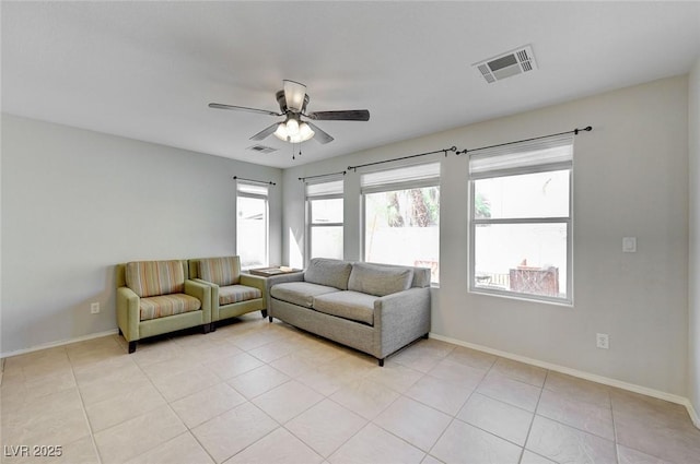 2586 Begonia Valley Ave, Henderson, NV 89074 - living area with a ceiling fan, baseboards, and light tile patterned floors