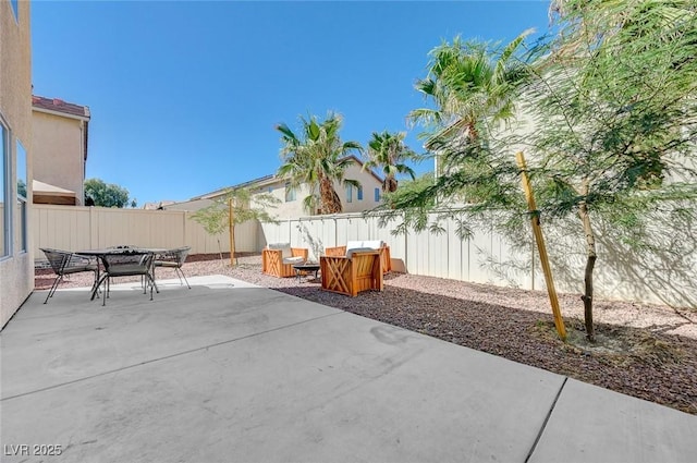 2586 Begonia Valley Ave, Henderson, NV 89074 - fenced backyard featuring outdoor dining area and a patio area