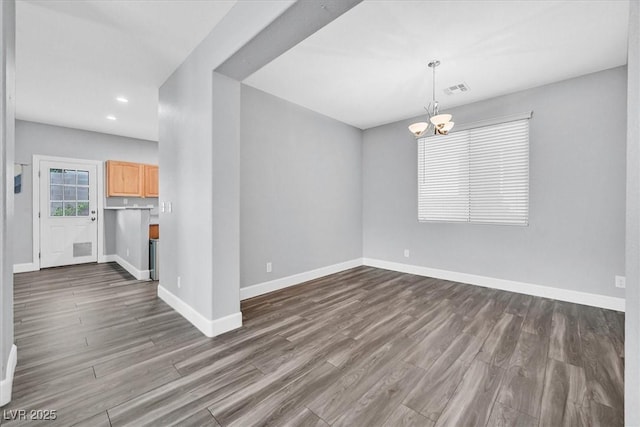9010 Wine Cellar Ave, Las Vegas, NV 89148 - unfurnished room with dark wood-style flooring, baseboards, a chandelier, and recessed lighting