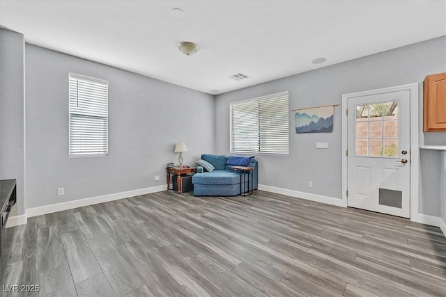 9010 Wine Cellar Ave, Las Vegas, NV 89148 - sitting room with light wood finished floors and baseboards