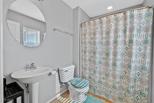 9010 Wine Cellar Ave, Las Vegas, NV 89148 - bathroom featuring toilet, a shower with shower curtain, and tile patterned floors