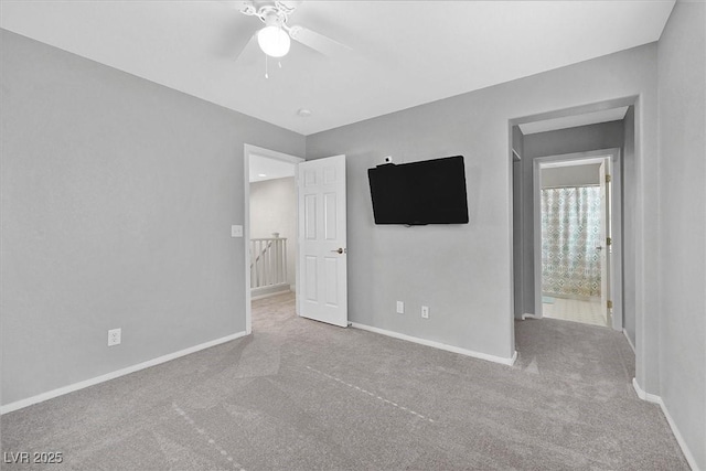 9010 Wine Cellar Ave, Las Vegas, NV 89148 - unfurnished bedroom with carpet flooring, baseboards, and a ceiling fan