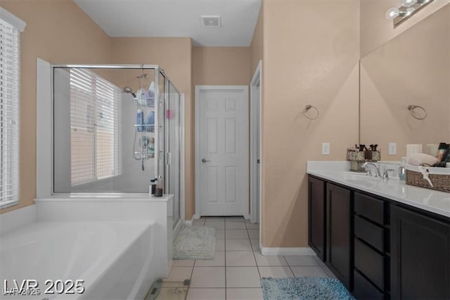 33 Via Di Mello, Henderson, NV 89011 - full bath featuring a shower stall, a bath, vanity, and tile patterned floors