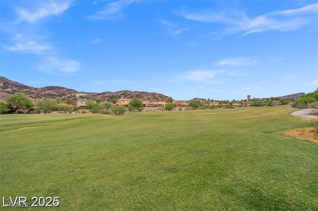 33 Via Di Mello, Henderson, NV 89011 - view of home's community with view of golf course, a mountain view, and a lawn