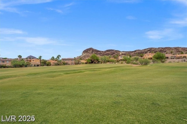 33 Via Di Mello, Henderson, NV 89011 - view of community with a mountain view, view of golf course, and a lawn