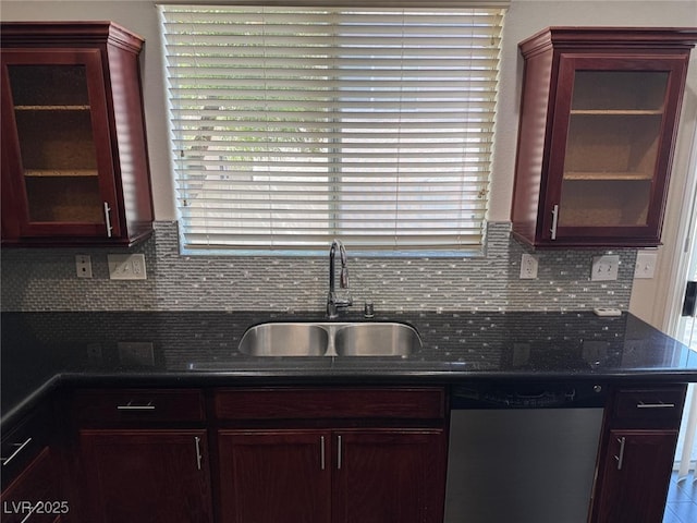 10118 Farmington Hall Ct, Las Vegas, NV 89129 - kitchen featuring a sink, stainless steel dishwasher, backsplash, and glass insert cabinets