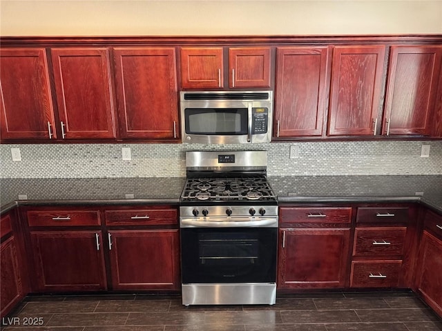 10118 Farmington Hall Ct, Las Vegas, NV 89129 - kitchen with stainless steel appliances, dark brown cabinets, and backsplash
