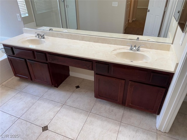 10118 Farmington Hall Ct, Las Vegas, NV 89129 - bathroom featuring double vanity, a tub, and tile patterned flooring