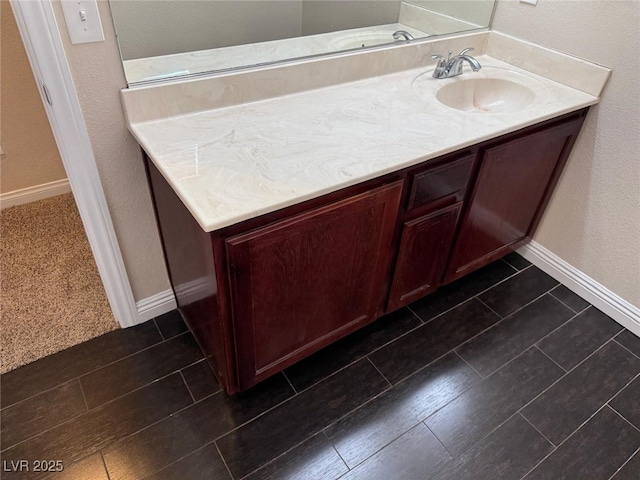 10118 Farmington Hall Ct, Las Vegas, NV 89129 - bathroom with vanity and baseboards