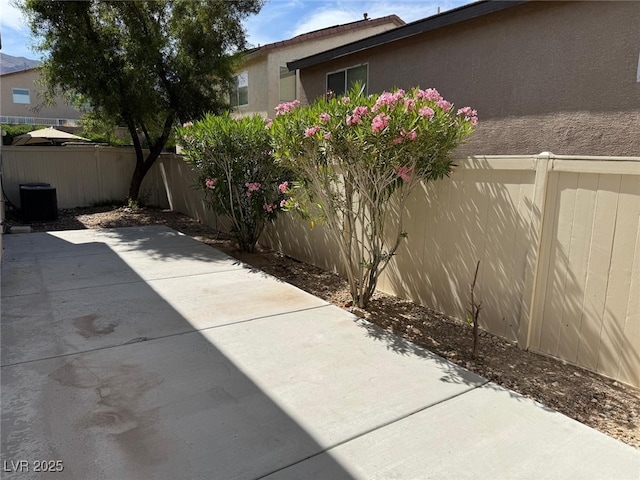 10118 Farmington Hall Ct, Las Vegas, NV 89129 - fenced backyard with a patio