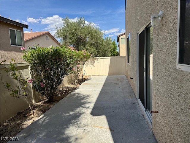 10118 Farmington Hall Ct, Las Vegas, NV 89129 - fenced backyard featuring a patio area