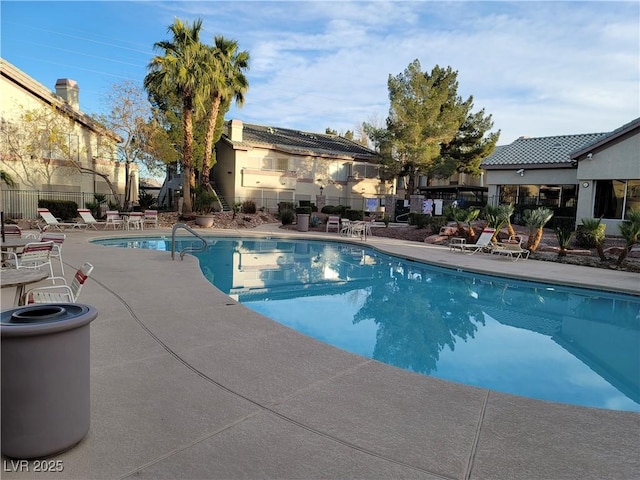 5710 E Tropicana Ave Unit 1172, Las Vegas, NV 89122 - community pool featuring a patio