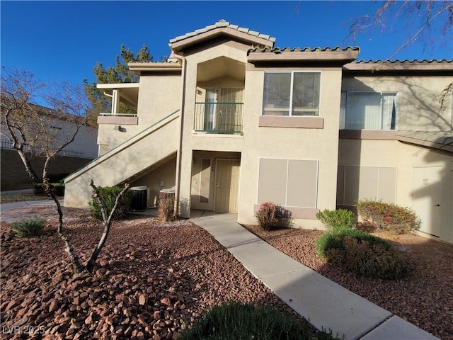 5710 E Tropicana Ave Unit 1172, Las Vegas, NV 89122 - view of building exterior with central air condition unit and stairway