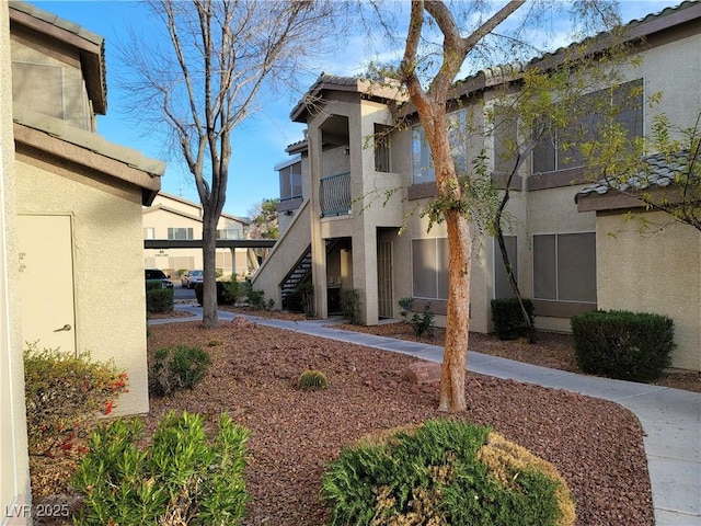 5710 E Tropicana Ave Unit 1172, Las Vegas, NV 89122 - view of property with stairway