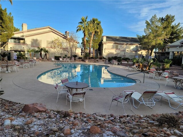5710 E Tropicana Ave Unit 1172, Las Vegas, NV 89122 - community pool with a patio area