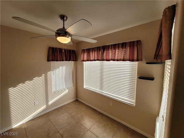 5710 E Tropicana Ave Unit 1172, Las Vegas, NV 89122 - unfurnished room featuring baseboards, tile patterned floors, and ceiling fan