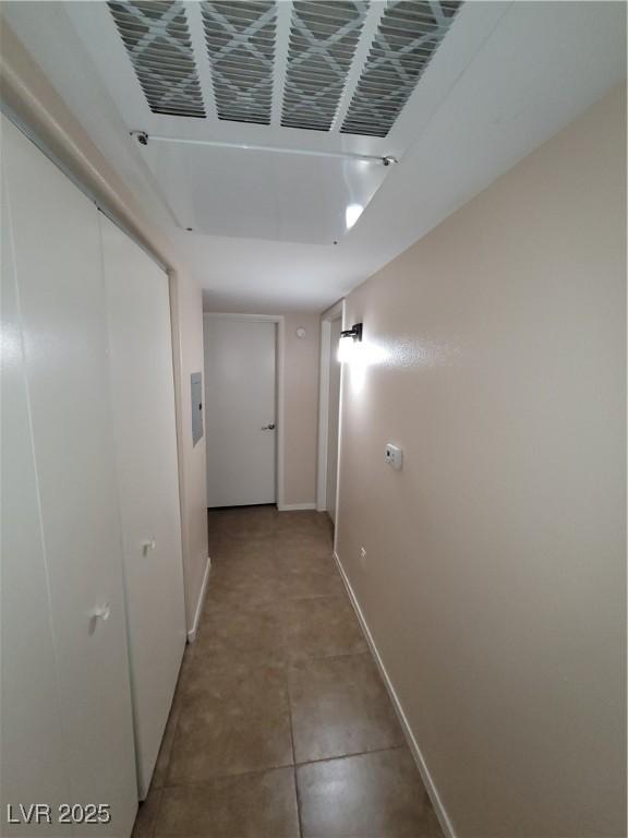 5710 E Tropicana Ave Unit 1172, Las Vegas, NV 89122 - corridor with baseboards and electric panel