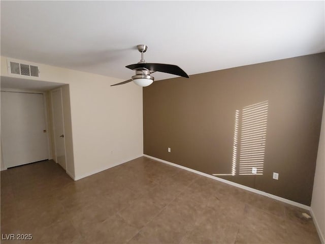 5710 E Tropicana Ave Unit 1172, Las Vegas, NV 89122 - spare room with a ceiling fan and baseboards