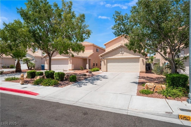 8872 Perfect Diamond Ct, Las Vegas, NV 89129 - view of front of house featuring stucco siding, an attached garage, and driveway