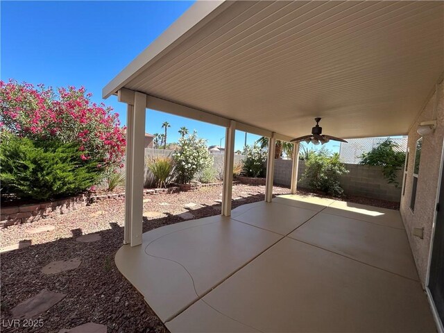 8872 Perfect Diamond Ct, Las Vegas, NV 89129 - fenced backyard with a patio and a ceiling fan