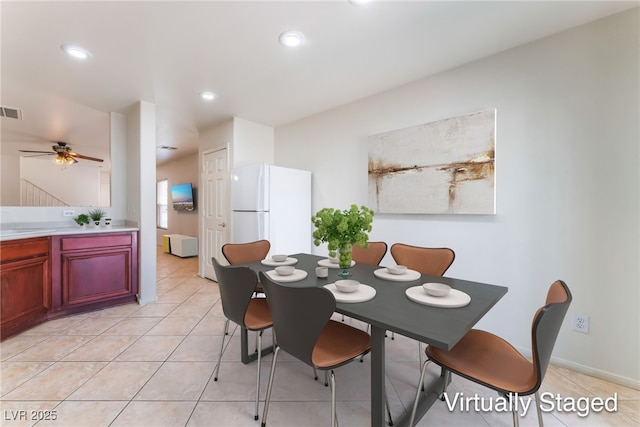 8872 Perfect Diamond Ct, Las Vegas, NV 89129 - dining room with light tile patterned floors, a ceiling fan, and recessed lighting