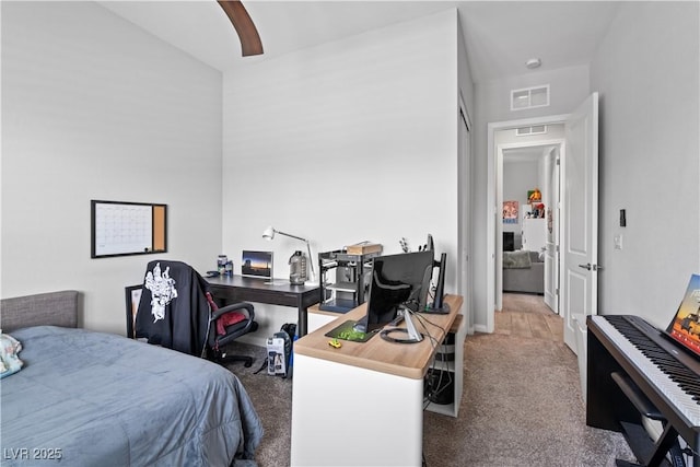 8668 Hartmont St, Las Vegas, NV 89166 - bedroom with carpet flooring, an office area, and ceiling fan