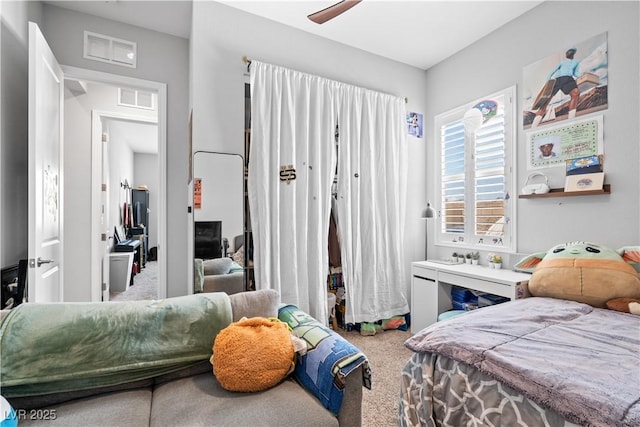 8668 Hartmont St, Las Vegas, NV 89166 - bedroom featuring carpet and a ceiling fan