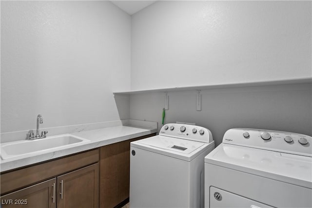 8668 Hartmont St, Las Vegas, NV 89166 - laundry area featuring washing machine and clothes dryer and cabinet space