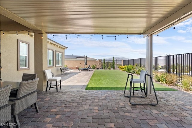 8668 Hartmont St, Las Vegas, NV 89166 - fenced backyard with a patio