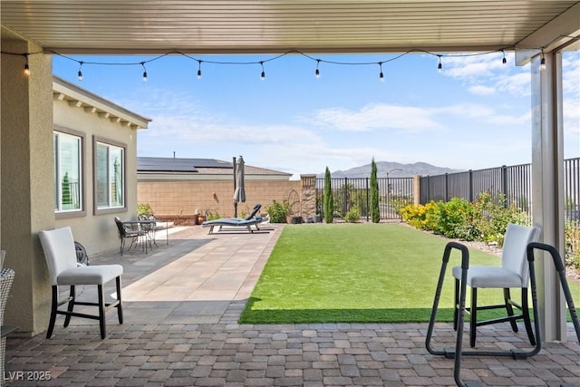 8668 Hartmont St, Las Vegas, NV 89166 - view of patio / terrace featuring a mountain view