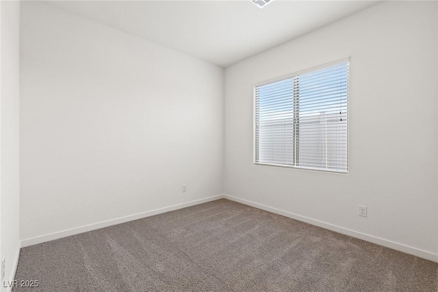 6731 Lotus Vista Ct, Las Vegas, NV 89156 - carpeted spare room with baseboards