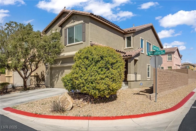 9190 Wine Cellar Ave, Las Vegas, NV 89148 - view of side of property with a tiled roof, stucco siding, a garage, and concrete driveway