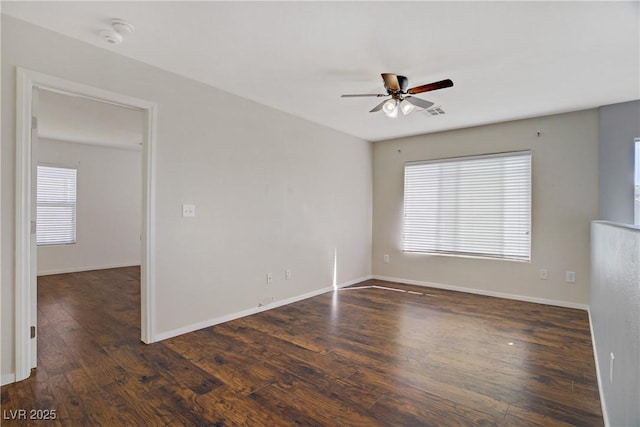 9190 Wine Cellar Ave, Las Vegas, NV 89148 - unfurnished room featuring a ceiling fan, healthy amount of natural light, wood finished floors, and baseboards