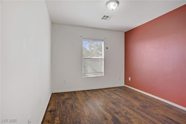 9190 Wine Cellar Ave, Las Vegas, NV 89148 - spare room featuring wood finished floors and baseboards