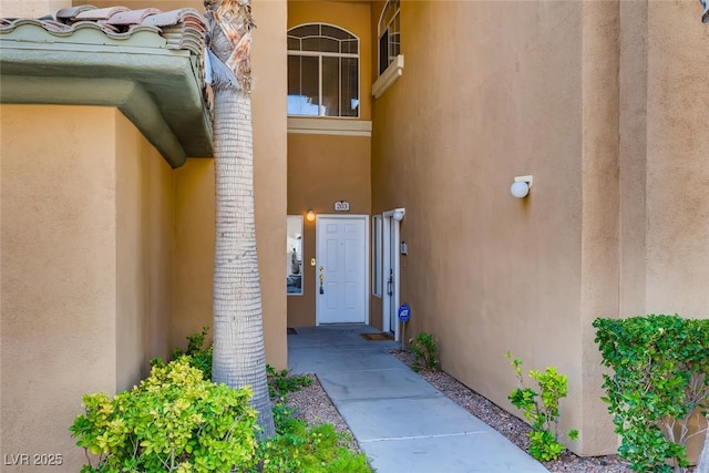 1713 Sky Of Red Dr Unit 203, Las Vegas, NV 89128 - view of exterior entry featuring stucco siding