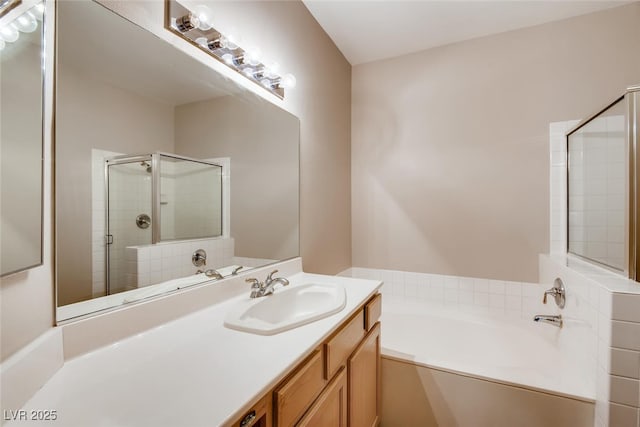 1713 Sky Of Red Dr Unit 203, Las Vegas, NV 89128 - full bath with a bath, vanity, and a stall shower