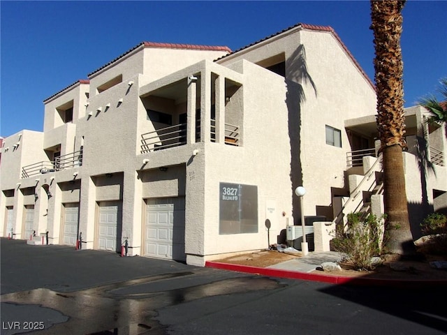 3827 Desert Marina Dr Unit 211, Laughlin, NV 89029 - view of property with a garage