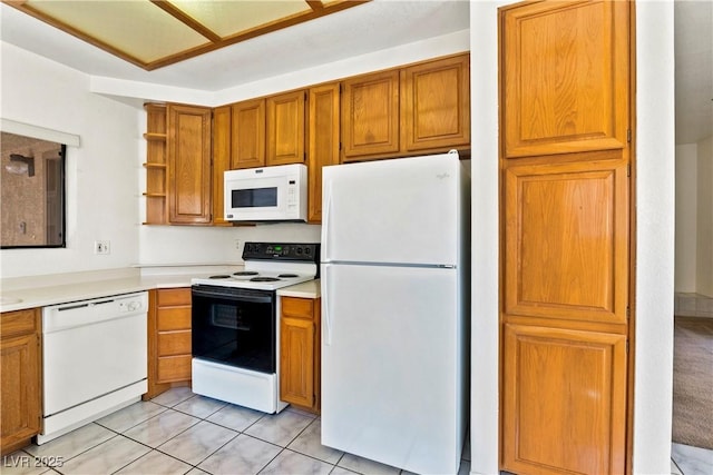 3827 Desert Marina Dr Unit 211, Laughlin, NV 89029 - kitchen with white appliances, open shelves, light countertops, brown cabinets, and light tile patterned floors